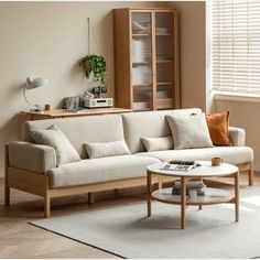 a living room scene with focus on the couch and coffee table