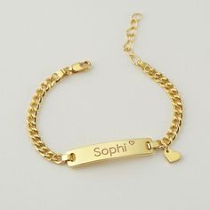 "Personalized this adorable baby bracelet with your kid's name on the bar and a cute charm of your choice, making a great gift idea for special occasions such as the first birthday, baptism and many more! ► PERSONALIZED KID NAME BRACELET WITH CHARM * Pendant measures approx: 32x6,5mm * By default, silver items comes with BLACK engraving and gold-plated item comes with CLEAR engraving. * Age group bracelet size recommendation: Newborn to 6 months - XXS: bracelet's circumference (includes opening) is 4\" 6 to 12 months - XS: bracelet's circumference (includes opening) is 4.5\" 12 to 24 months - S: bracelet's circumference (includes opening) is 5\" 2 to 5 years - M: bracelet's circumference (includes opening) is 5.5\" 6 to 8 years - L: bracelet's circumference (includes opening) is 6\" 9 to13 Adjustable Name Bracelet With Birthstone For Birthday, Adjustable Birthstone Name Bracelet For Birthday, Personalized Nameplate Bracelet Gift, Personalized Nameplate Bracelet, Cute Name Bracelet For Valentine's Day Gift, Cute Hypoallergenic Charm Bracelet For Birthday, Cute Charm Bracelet For Birthday And Valentine's Day, Personalized Cute Bracelets For Valentine's Day, Customized Cute Gold Name Bracelet