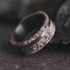 two wedding bands made out of antler wood