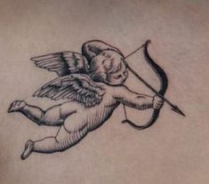 an angel with a bow and arrow tattoo on the back