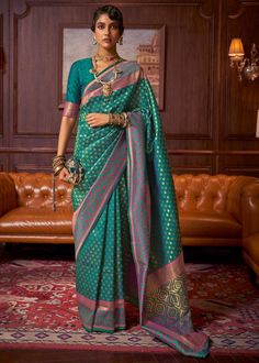 This soft Banarasi Saree is smooth with engraved designs to enhance the overall appeal of the saree. Rich incredible details with beautiful colour, this is a beauty to behold ... --------------------------------- S A R E E ● D E T A I L S --------------------------------- ● Fall and Edging : Done ● Tassel : See in Option ● Petticoat : On request Extra Charges ● Drapping Saree (Ready to wear) : On Request Extra Charges ● Blouse : Matching Unstitched Piece (See in option) ● Occasion : Wedding, Party, Festive, Function ● Type: Bollywood ● Includes : 1 Saree, 1 Blouse Piece ● Saree length : 5.5 meter ● Blouse piece : 0.8 meter ● Wash Instruction:- Dry Clean Only Premium quality Product with Fine Finishing 🎁      Gift for Women This lovely Weaving Silk Saree makes for a fantastic gift for your Blouse Designs For Banarasi Saree, Teal Green Blouse, Blue Silk Saree, Design Saree, Handloom Weaving, Green Saree, Art Silk Sarees, Trendy Sarees, Banarasi Saree