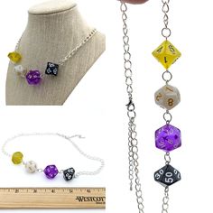 This RPG-inspired necklace features polyhedral dice that mirror the colors of the non-binary pride flag: yellow, white, purple, and black. Signal your pride and love of gaming with this geeky, quirky, fun necklace. Great for lovers of D&D, Pathfinder, or other tabletop RPG games. I make the jewelry from standard-size dice sets, drilling holes and inserting screw eyes. All metals used are lead free and nickel free. Choose from gold- or silver-colored chain. Each necklace is about 18 inches long ( Dice Necklace, Non-binary Flag, Geeky Jewellery, Non Binary Pride, Inspired Necklace, Polyhedral Dice, Drilling Holes, Non Binary, Rpg Games