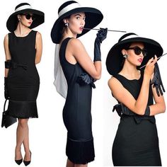 three women in black dresses and hats posing for the camera