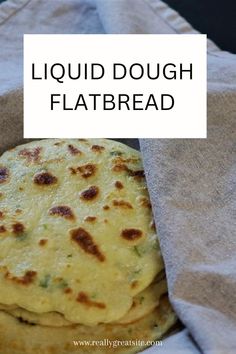 a stack of flatbreads sitting on top of a cloth