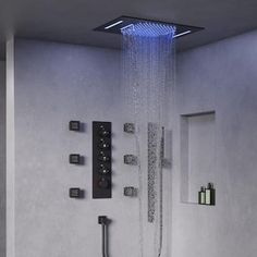 a shower head with blue lights on it