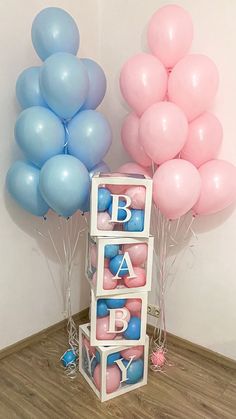 balloons and baby blocks are on the floor