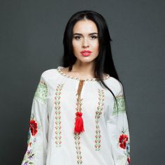 "Embroidered blouse \"Whisper of poppies\" is made accordingly to traditions of ukrainian style. This embroidered boho blouse has a wide sleeve and neck with drawstring. From shoulder line begins hand floral embroidery. The main feature of the peasant blouse ia a combination of various embroidery techniques - cross-stitch and satin stitch embroidery on sleeves. The cross stitch embroidery is made with calm green tones on this mexican blouse. This Embroidered white blouse can be worn with a skirt Folk Style Peasant Tunic Top With Floral Embroidery, Folk Style Peasant Top With Floral Embroidery, Folk Style Embroidered Tunic Top, Bohemian Tunic Blouse With Floral Embroidery, Folk Style Tunic Blouse With Intricate Embroidery, Folk Style Tunic Blouse With Embroidered Neckline, Folk Style Tunic Blouse With Floral Embroidery, Folk-style Tunic Blouse With Intricate Embroidery, Folk Style Floral Embroidery Tunic Blouse