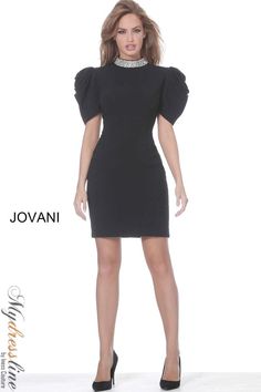 Looking for a chic and contemporary dress that will make you stand out from the crowd? Look no further than the Jovani M2941. This gorgeous dress features a high neckline, short sleeves, and a figure-flattering silhouette that is sure to turn heads. Plus, the sleek black color is perfect for any formal occasion. Add some statement jewelry and heels to complete the look. Unique Dresses Short, Contemporary Dress, Jovani Dress, Short Sheath Dress, Embellished Cocktail Dress, Dress Couture, Long Sleeve Fitted Dress, Simple Prom Dress, Contemporary Dresses