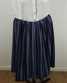 Navy striped Skirt size 24, elasticated waist 38in, length 26 in below knee length with back kick pleat, machien wash 40 deg C, easy care, drip dry Casual Striped Pleated Bottoms, Casual Striped Pleated Skirt, Striped Relaxed Knee-length Skirt, Striped Pleated Knee-length Skirt, Striped Knee-length Relaxed Skirt, Casual Striped Knee-length Skirt, Striped Lined Skirt For The Beach, Striped Lined Skirt For Beach, Striped Beach Skirt With Lining