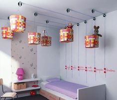 two pictures of children's room with toys hanging from the ceiling