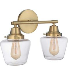 Usually ships in 5 to 10 days. Live chat to confirm stock.A timeless classic, the Essex collection from Craftmade features clear glass schoolhouse globes and is available in five sizes and three finishes - Satin Brass, Flat Black, and Brushed Polished Nickel.Finish: Satin BrassHeight: 11.02Length: 9Width: 17.5Extension: 9Canopy_Height: Canopy_Width: Back_Plate_Height: 5.5Back_Plate_Width: 5.5Back_Plate_Depth: 1Bulb_Count: 2Socket_Type:E26Bulb Type If Included: Recommended Bulb: A19Color_Temperat Vanity Light Bulbs, Brass Vanity Light, Transitional Vanity, Vintage Edison Bulbs, Transitional Modern, Light Vanity, Bath Light, Wall Fixtures, Garden Lamps