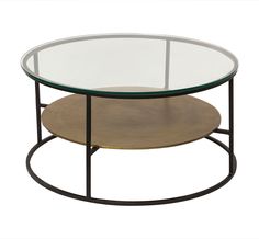 an oval glass table with metal frame and two trays on the bottom, against a white background