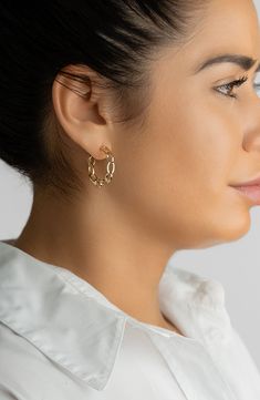 Polished 14-karat-gold plating adds warmth to hoop earrings with a chain-link design. 1.25" hoop diameter; 0.25" width Post back 14k-gold plate Imported Yellow Gold Chain Earrings For Everyday, Everyday Yellow Gold Chain Earrings, Modern 14k Gold-filled Pierced Hoop Earrings, Elegant Chain Link Hoop Earrings For Pierced Ears, Gold Round Chain Earrings, Modern 14k Gold Filled Pierced Hoop Earrings, Yellow Gold Link Earrings For Everyday, Everyday Yellow Gold Link Earrings, Gold Plated Chain Link Earrings