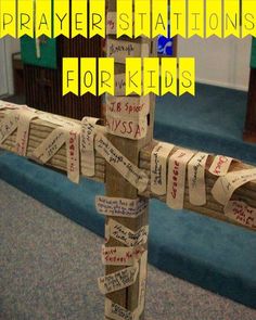 a cross made out of pieces of paper with the words prayer stations for kids written on it