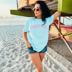 Beach Bum Tee | Shop Mountain Moverz T-Shirts Beachy Cotton T-shirt With Text Print, Beachy Cotton T-shirt, Pre-shrunk, Beachy Cotton Tops For Poolside, Beachy Cotton T-shirt, Cotton Beachy Tops For Poolside, Beachy Cotton T-shirt Pre-shrunk, Beachy Cotton Pre-shrunk T-shirt, Beachy Cotton Surfing T-shirt, Poolside Crew Neck T-shirt For Beach Season