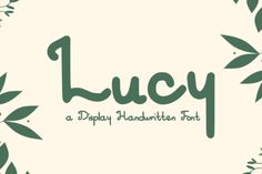 the word lucy is written in green and white with leaves around it on a beige background