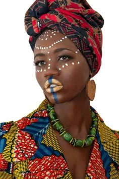 an african woman with painted face and headdress on the cover of a magazine