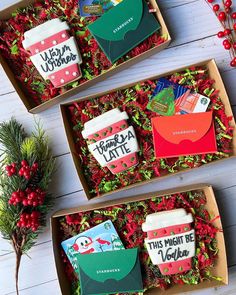 three boxes filled with different types of christmas cards