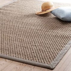 a rug with the words alomba bastide beige in front of it