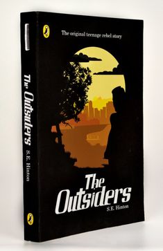 the book cover for the outsiders by s e hintman, with an image of a man standing in front of a tree