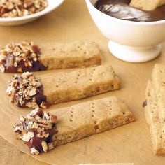 crackers with chocolate and nuts are on a table