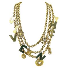 A standout Vintage Givenchy Logo Charm Collar. Crafted in gold plated metal, crystals and faux pearls. Featuring three lavish chunky chains embellished with an array of logo centric charms including ultra large GIVENCHY spell out letter charms. In very good vintage condition, signed and approx. 54cm length for the shortest chain and approx. 11cm drop. An absolutely fantastic runway piece from the House of Givenchy that will be sure to make the perfect couture statement. Dress it up or down. The Jennifer Gibson, Givenchy Jewelry, Givenchy Logo, Chain Collar, Vintage Givenchy, Charm Chain, Vintage Jewels, Letter Charms, Multi Strand Necklace