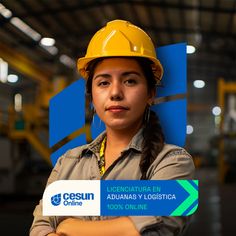 a woman wearing a hard hat and holding a business card