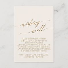 a wedding wish card with the words wishing well written in cursive writing on it