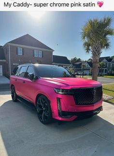 a pink suv parked in front of a house with the caption my caddy - super chrome pink satin