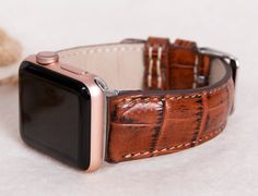 Croco pattern brown Apple watch strap for series 1-10 & SE & Ultra 1-2.  Material: full grain leather (leather is not croco). Our leathers are premium quality full-grain leather tested by international firms. This band is M/L size and fits 160-200mm (6.4"-8") wrists. The color of the buckle will be the same of the adapter color. Customization: We can write names, dates, texts on straps.  CUSTOMER SATISFACTION GUARANTEE: If you are not satisfied with our items within 30 days after you receive the Brown Leather Strap Apple Watch Band, Modern Brown Rectangular Apple Watch Band, Modern Brown Rectangular Watch Accessories, Modern Brown Apple Watch Band As Gift, Brown Bracelet Strap Apple Watch Band For Gift, Brown Bracelet Strap Apple Watch Band As Gift, Brown Rectangular Watch Accessories With Bracelet Strap, Brown Rectangular Bracelet Strap Watch Accessories, Brown Adjustable Rectangular Watch Bands