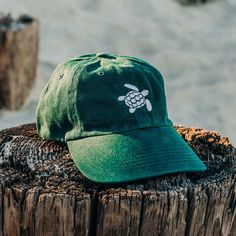 Green original turtle on front and green "Sea Green Apparel" embroidery on back 100% Cotton Twill Metal rivet on back Adjustable strap with buckle for comfortable wear Turtle Hat, Sea Photography, Green Turtle, Ocean Theme, Sea Art, Green Sea, Marine Animals, Kids Swimming, Ocean Photography