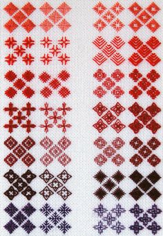 the cross stitch pattern is in red and black, but it looks like they have different designs on them