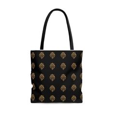 Thank you for visiting our shop ♡Eco friendly reusable tote. No more plastic bags! This custom, black, large tote features the beautiful, Heart of Viana pattern in gold print. Make a statement with this chic gold and black bag while you shop!Tote is made from 100% Polyester with two handles for carrying. Heart of Viana print is printed all over the tote. Perfect for your groceries, belongings, beach bag, etc. Endless options with a reusable bag!Large Tote measures 18 x 18 inches. Machine washabl Eco-friendly Black Shoulder Bag Gift, Black Eco-friendly Bag As Gift, Eco-friendly Black Bags For Gifts, Eco-friendly Black Bag For Gift, Large Black Bag For Gift, Black Tote Shoulder Bag Gift, Black Reusable Shopping Bag, Black Tote Shoulder Bag For Gift, Large Black Shoulder Bag As Gift