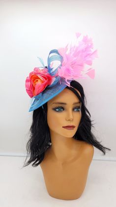 Teal Blue Wedding Fascinator with shades of pink and Coral.   Bridesmaids Hat Kentucky Derby Cocktail Party Tea Party Guest Easter Kate Middleton  - Headband and hairclip  - Ready to ship  - Lightweight - Free Shipping - Fast shipping - Customize by adding different color flowers and or feathers Check my store for styles and colors.  Hatsandpearls.etsy.com Find more at my website: Www.hatsandpearls.com  Reach out to me if you can't find what you are looking for.  I can make cake custom orders and help you style and match your outfit  Tag and share your pictures when you wear and style our hats.  Instagram: @hats_pearls Facebook: Hats Pearls Thank you for visiting and happy shopping! Blue Brimmed Mini Hats For Party, Pink Headband Mini Hats For Carnival, Blue Summer Costume Hats And Headpieces For Party, Whimsical Hats For Wedding And Carnival, Whimsical Wedding Hat For Carnival, Pink Hat For Evening Carnival, Multicolor Party Hat Headpiece, Multicolor Brimmed Mini Hats For Party, Spring Wedding Multicolor Fascinator