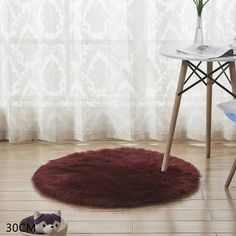 Descrption: Product Name: Living room furry floor mat Material: Polyester (polyester) Size: Size: Diameter 30cm/11.8in / Diameter 80cm/31.5in Feature: 1. Non-slip design: the surface is fine and soft and comfortable, and the back is suede interlined with non-slip softness, so there is no need for children or pets to fall down while playing on the luxurious furry area carpet. Before placing a thick, comfortable and chic carpet on the floor, always keep the bottom dry and clean 2. Wide range of ap Shag Rug Living Room, White Faux Fur Rug, Nordic Rug, Bedside Rugs, Nordic Living Room, Faux Fur Rug, Solid Color Rug, Fur Rug, White Carpet