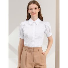 A basic button-down shirt features short puff sleeves bringing a touch of femininity and detail to any of the work-wear and making them look elegant. This puff-sleeve shirt is made of lightweight soft cotton fabric, drapes beautifully, and ensures you stay comfy all day. Pair this work office shirt with shorts, work pants, or casual jeans. Elegant Puff Sleeve Button-up Top, Elegant Cotton Short Sleeve Shirt, Fitted Short Sleeve Shirt With Buttons, Classic Short Sleeve Blouse For Business Casual, Elegant Cotton Puff Sleeve Top, Short Sleeve Shirt For Spring Formal, Fitted Puff Sleeve Shirt With Buttons, Classic Short Sleeve Tops For Formal Occasions, Solid Short Sleeve Blouse For Business Casual