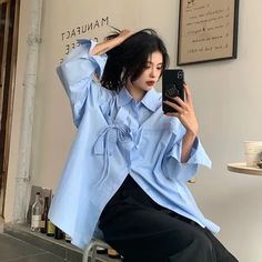 Elegant White Blouse: Oversized Long Sleeve Harajuku Top   1Measurement In CMsizeBust(cm)Body Length(cm)Sleeve(cm)S1156852M1196953L1237054XL12771552XL1317256 Oversized Short Sleeve Office Blouse, Oversized Short Sleeve Blouse For Office, Blue Oversized Long Sleeve Blouse, Oversized Blue Long Sleeve Blouse, Oversized Long Sleeve Shirt For Office, Casual Blue Blouse With Batwing Sleeves, Casual Blue Batwing Sleeve Blouse, Oversized Blue Blouse With Batwing Sleeves, White Shirts For Women