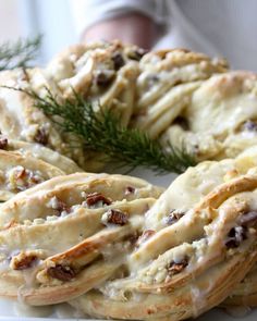 a white plate topped with cookies covered in icing