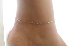 Shimmering stainless steel chains glitter all around your ankle to create this mesmerizing dainty anklet. This anklet is adjustable between 9 - 11 inches long. The 2x3mm stainless steel chains are finished with a stainless steel spring ring clasp. These stainless steel anklets are resistant to corrosion and anti-tarnish. More stainless steel jewelry is available here: https://www.etsy.com/shop/FiveOfMine?ref=seller-platform-mcnav&search_query=stainless+steel Matching necklace: https://www.et Minimalist Metal Anklets Perfect For Gift, Minimalist Metal Anklets As A Gift, Minimalist Metal Anklets For Gift, Dainty Adjustable Nickel-free Anklets, Minimalist Chain Anklets, Trendy Silver Anklets With Adjustable Chain, Silver Minimalist Anklets For Party, Trendy Silver Adjustable Chain Anklets, Trendy Silver Adjustable Anklets