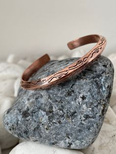 "Discover our beautiful and unique Handmade Pure Copper Bracelet from Nepal 🌍✨Crafted with love by skilled Nepali artisans whom we work closely with to bring our vision to life, these timeless accessories are simple yet exquisite. Add a touch of charm to your wrist with this special copper bracelet, carefully crafted by talented artisans in Kathmandu Nepal. The beautiful detailing and warm copper tones make it a timeless accessory that goes with any outfit. Wear a piece of Nepal's craftsmanship Pyramid Shape, Copper Jewellery, Skin Discoloration, Copper Bracelet, Timeless Accessories, Bracelet Handmade, Cuff Bangles, Pure Copper, Polish Jewelry