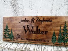 a wooden sign that says, jordan and stephanie walter