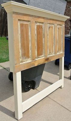 an old bed frame with wooden slats on it