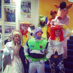 some people are dressed up as toy story characters