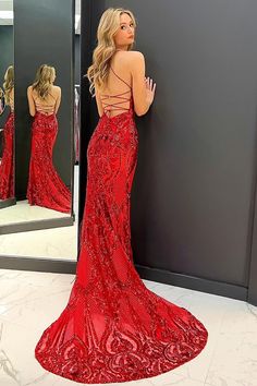 Let your entrance be as captivating as you are in our Alexa, the mermaid-style red sequin prom dress. Its sequined lace fabric glitters and glows, reflecting light with your every move. It's a perfect balance between bold style and timeless elegance, ensuring you're the center of attention. Alexa s mermaid silhouette is a beautiful choice for showcasing your curves, and it features a deep V neckline and spaghetti straps that lead to a crisscross back. These touches add an element of surprise and White Jumpsuit Wedding, Boho Wedding Gowns, Wedding Dress Cap Sleeves, Beach Bridal Gown, Bridal Jumpsuit, Reflecting Light, Wedding Jumpsuit, Mermaid Sequin, Sequin Prom Dress