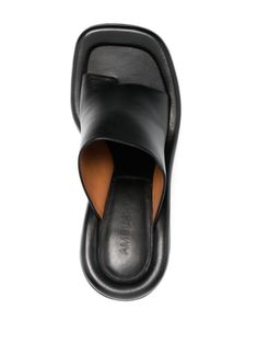 Luxury Padded Heel Slip-on Slides, Luxury Suede Slip-on Mules, Luxury Slip-ons With Square Toe, Luxury Textured Sole Slip-on Mules, Luxury Slip-on Monk Strap Shoes With Almond Toe, Luxury Padded Heel Mules For Work, Luxury Black Slippers With Branded Insole, Luxury Slip-on Dress Shoes With Contrast Sole, Luxury Fitted Square Toe Sandals