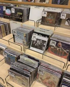 there are many cds on display in the store