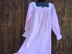 "100% cotton pink nightgown.  Labeled size small but easily fits up to a large.   Good condition! Measurements taken across front laid flat Bust : 20\" waist  : 25\"  length :  50\"" Pink Cotton Nightgown For Sleepover, Pink Cotton Nightgown For Bedtime, Pink Cotton Nightgown With Lace Trim, Pink V-neck Nightgown For Home, Pink V-neck Nightgown For Loungewear, Pink V-neck Nightgown, Casual Pink V-neck Nightgown, Vintage Pink Sleeveless Nightgown, Pink Nightgown