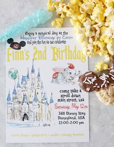 a mickey mouse birthday party with popcorn and treats