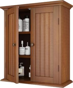 a wooden cabinet with two doors and shelves