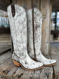 Introducing the Liberty Black Ladies Pelo Granizo Blaco Cafe Round Toe Boots. Crafted with genuine cowhide, these boots may have slight color variations or imperfections, adding to their unique charm. The comfortable 2" heel and 15" shaft height make them perfect for all-day wear. Available in a variety of sizes with a calf circumference of 17". Expertly designed with a snip toe for a stylish touch. *No pair will be the same! Click on the size you’d like to see the photo of that particular pair! Cow Hide Boots, Cute Shoes Boots, Vision Bored, Round Toe Boots, Girly Pop, Closet Goals, Shoe Inspiration, Rounded Toe Boots, Toe Boots